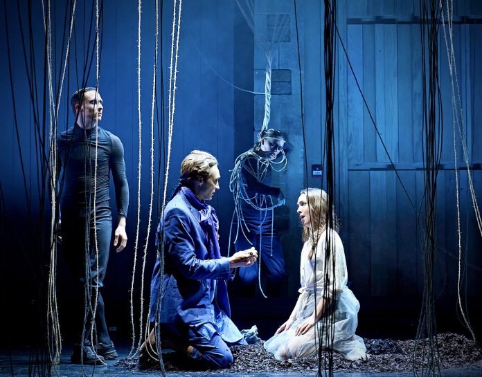 Archie White (Dancer), Martins Smaukstelis (Tamino), Thea Kallhed Möller (Dancer), and Olivia Warburton (Pamina) in The Magic Flute at Nevill Holt Festival (credit Manuel Harlan)